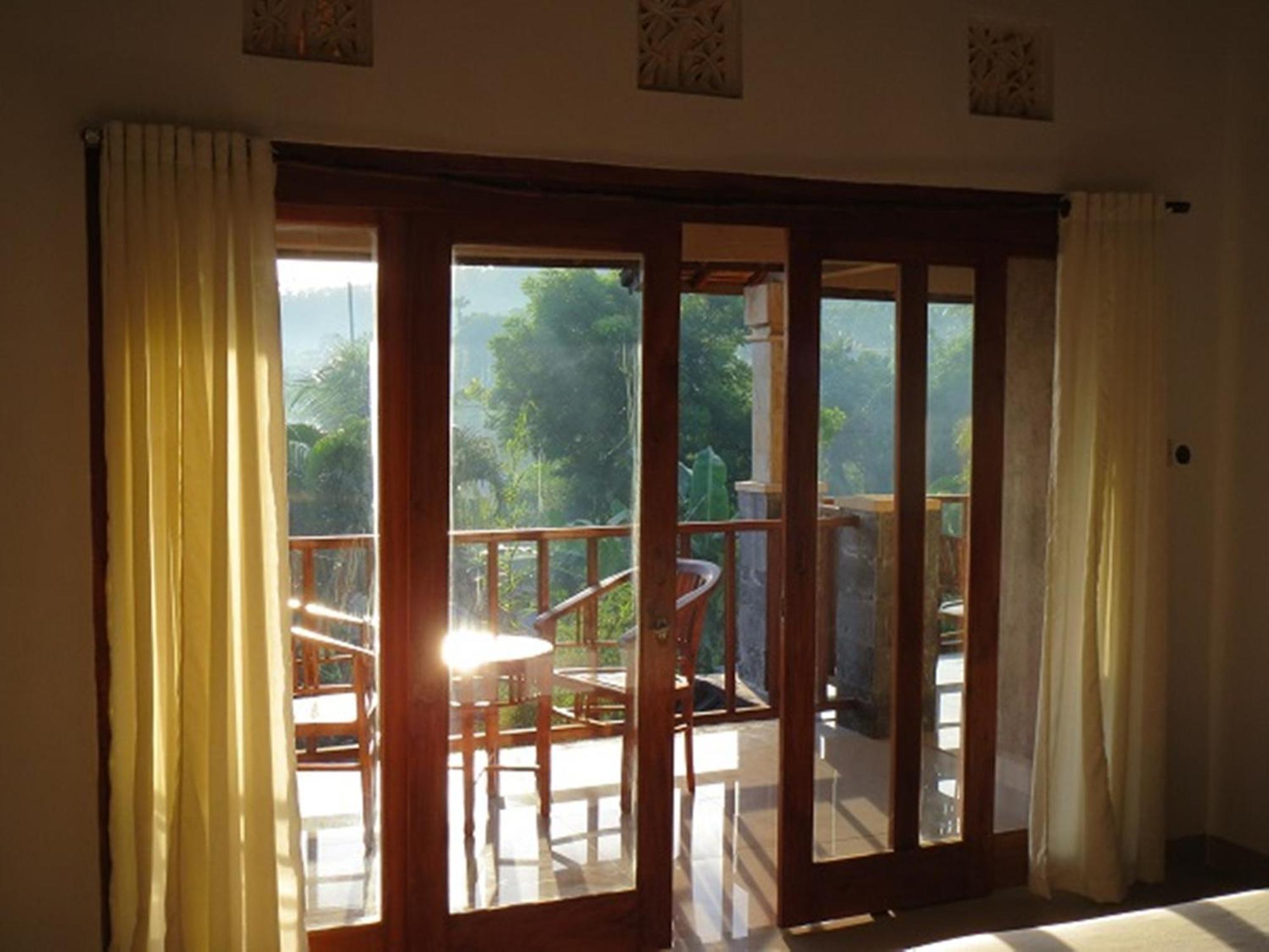 Bali Sari Homestay Amed Habitación foto