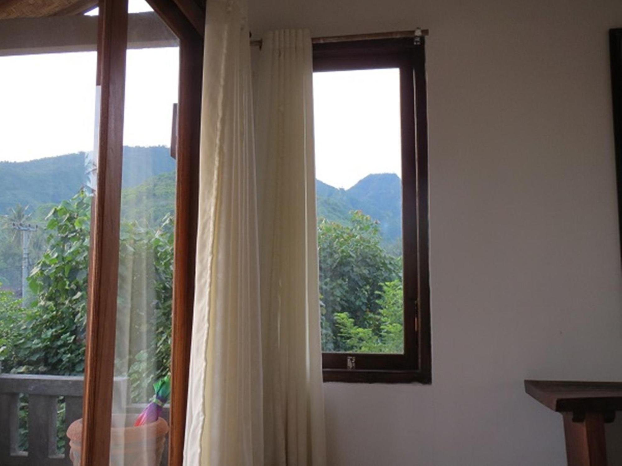 Bali Sari Homestay Amed Habitación foto